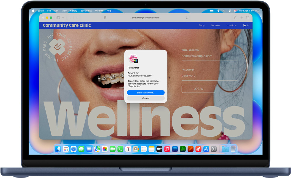 MacBook Neo i farven indigo, hvor Safari beder brugeren om at logge ind med Touch ID eller adgangskode på websitet Community Care Clinic