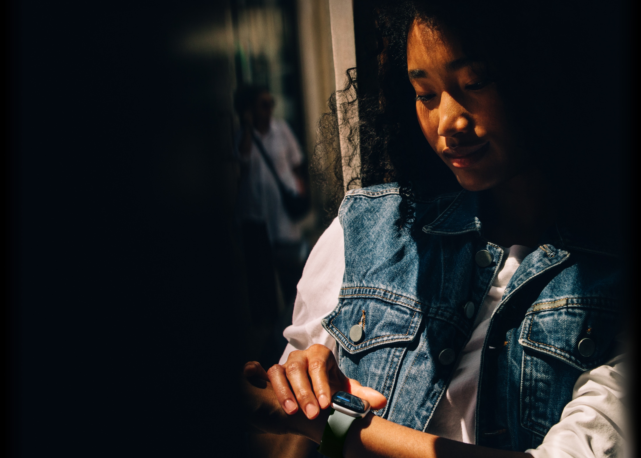 A person checks Messages on Apple Watch Series 11