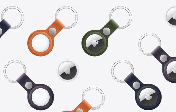 O gamă de AirTags și AirTags cu breloc din țesătură FineWoven în culori diferite, inclusiv Portocaliu, Verde închis, Albastru profund, Mură și Negru