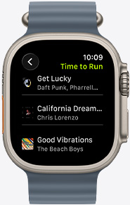 Apple Watch screen featuring a Fitness+ playlist including songs by The Weeknd, Skrillex, Justin Bieber and Shawn Mendes