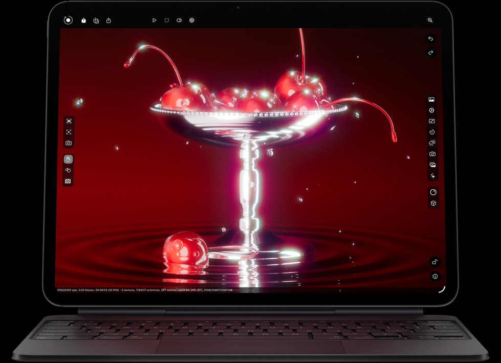 iPad Pro, landscape orientation, front exterior, space black colour, rounded corners, black display bezel, attached to Magic Keyboard in landscape orientation, front exterior, black colour, screen displaying photo editing app with a vibrant image of cherries in a martini glass–shaped bowl with water droplets