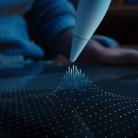 Apple Pencil Pro, white color, tip of device hovering on iPad display showing a grid of dots with some rising into columns toward the Apple Pencil Pro tip