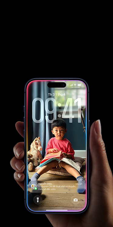 Hand holding iPhone 17 Pro, Message pop-up on personalized Lock Screen